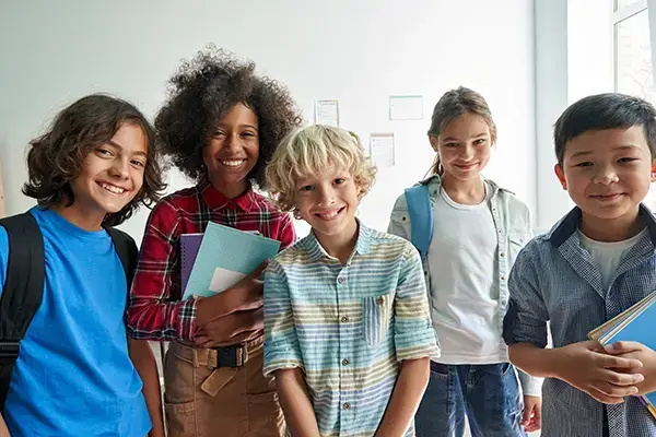 Group of happy children at school in Westlake Village, CA, representing the positive outcomes of child therapy program with Julie Klamon, LMFT