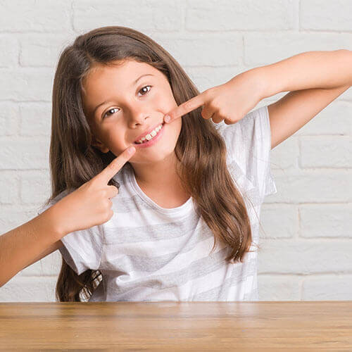 Child in therapy for depression, looking happy