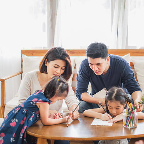Mother, father and children in family therapy for co-parenting and divorce counseling